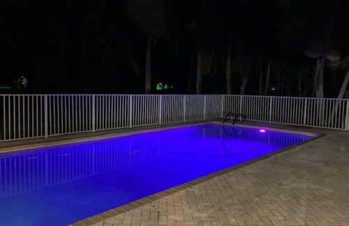 Lake Worth House | Golf course view & heated pool home