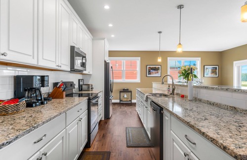 Kewadin House | 🏘️ Golf in Luxury - 4BDR Home on Agaming Golf Course - by Torch Lake