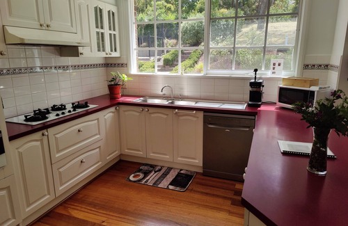 Eltham House | Gorgeous 4-Bedroom Home & Venue on a Mansion - an acre land with Pool & Garden n