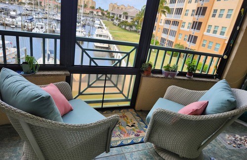 Burnt Store Marina Condo | Gorgeous Harbor View and Magnificent Sunsets! Watch the Manatees play!