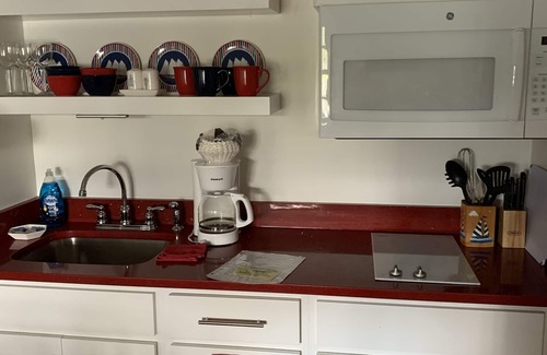 East Harwich Apartment | Gorgeous lake beachfront private apartment with canoe, kayaks, & home theatre