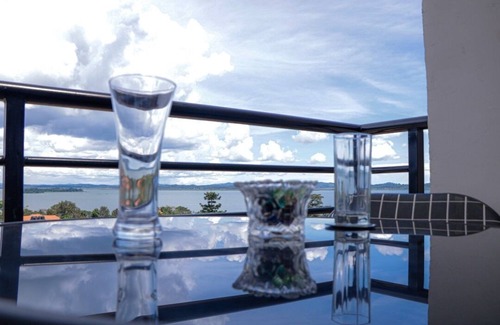 Kireka Apartment | Gorgeous lake view apartment with the option to cozy in or bask outside.