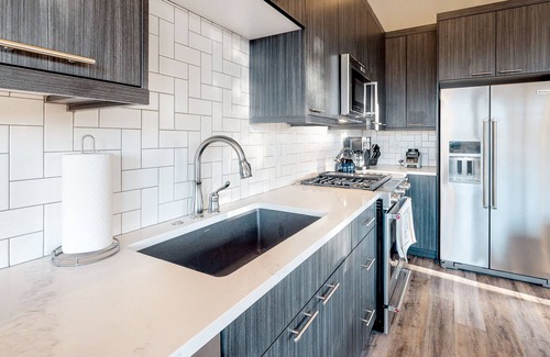 Rendezvous House | Gorgeous, modern house with patio, fireplace, private hot tub, & mountain views