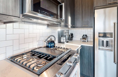 Rendezvous House | Gorgeous, modern house with patio, fireplace, private hot tub, & mountain views