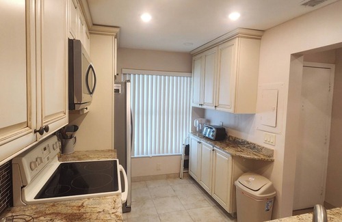Casa del Mar Condo | Gorgeous Second Floor Waterfront Villa with Sunset views over Boca Ciega Bay!