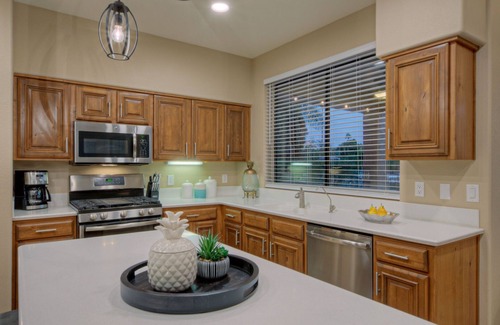 Crystal Shores House | GORGEOUS Val Vista Lake VIEW: Htd PVT POOL, Spa, Putt Green, Kayaks, Bikes, Fishing