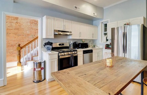 North Capitol Street House | Gorgeous Victorian Townhome with Balcony in Vibrant Washington.
