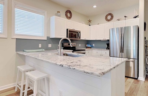 Litchfield by the Sea Condo | Gorgeous View of Osprey Lake & Near pool & Beach at Litchfield by the Sea