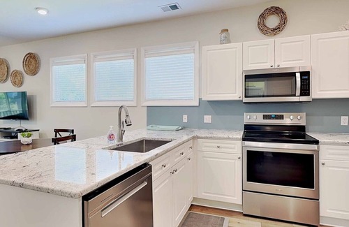 Litchfield by the Sea Condo | Gorgeous View of Osprey Lake & Near pool & Beach at Litchfield by the Sea