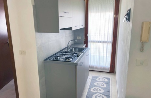 Rosapineta Apartment | Great flat in a residence with pool in Rosolina