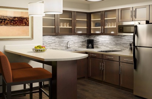 Rossford Condo | Great for Business Travelers! 24h Business Center + Free Breakfast!