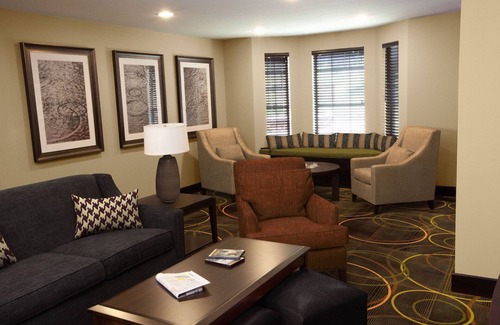 Rossford Condo | Great for Business Travelers! 24h Business Center + Free Breakfast!