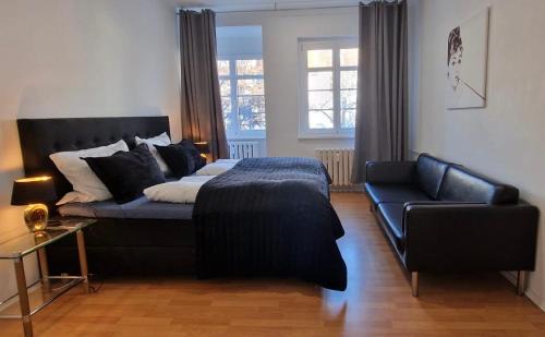 Daberstedt Apartment | Große Ferienwohnung Nähe Stadtpark, 4 Schlafzimmer, gemütliches Wohnzimmer, Terrasse, Parkplatz