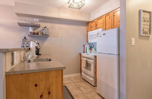 Silver Star Mountain Condo | Ground Floor Creekside Condo - Bike right to your door - BBQ, A/C - Pet Friendly