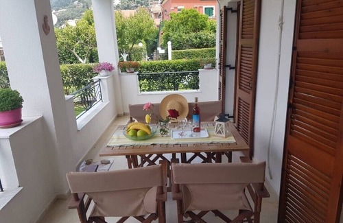 Agios Gordios Apartment | Ground floor apartment in its own pretty garden