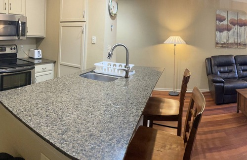 Waters Park Condo | Ground Floor Condo in Gated Quiet Complex near the Domain, King Bed