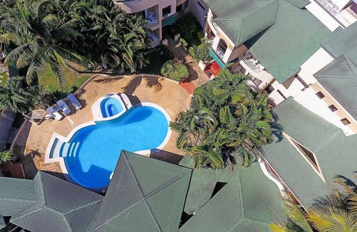 Villas Ana Maria Apartment | Guest-friendly apartment in central Sosua, pool/internet/cable TV/free breakfast