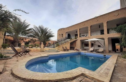 Tozeur Apartment | Guest house Dar Traki Tozeur tourist area with swimming pool and breakfast included.