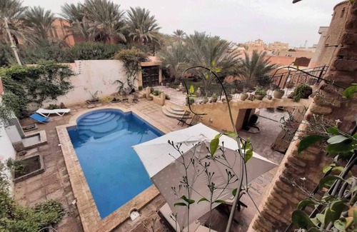 Tozeur Apartment | Guest house Dar Traki Tozeur tourist area with swimming pool and breakfast included.