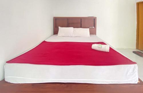 Slawi Hotel | Guest House Hj Muriyah Syariah Slawi Mitra RedDoorz