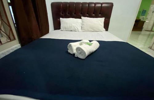 Slawi Hotel | Guest House Hj Muriyah Syariah Slawi Mitra RedDoorz
