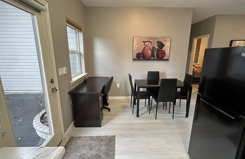 Meadow Glade Cottage | Guest House nestled in the trees with large deck, full kitchen, and laundry