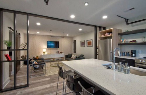 Charlotte House | Guest house · Ultra Modern open w/retractable glass garage door