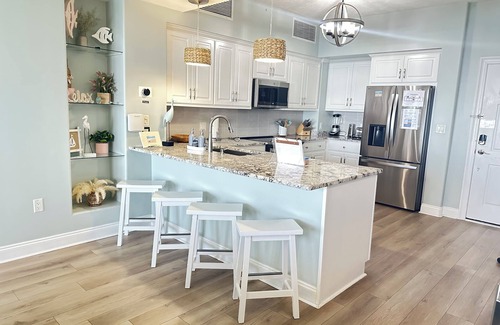 Thomas Drive Condo | Gulf Front with 40' Balcony waiting on you!