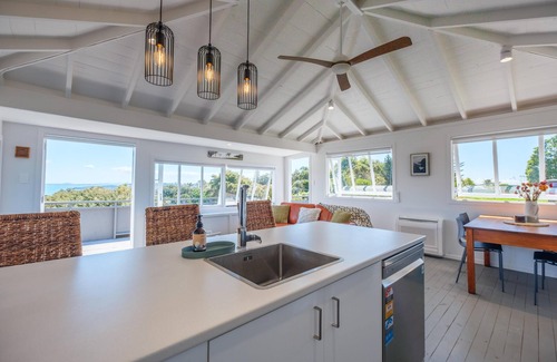 Palm Beach House | Gulf Island Views - Welcome to Gulf Island Views, a beautifully restored premium holiday cottage with incredible views of the Hauraki Gulf. With two bedrooms and one bathroom this is perfect for a family of four or two couples to share.
