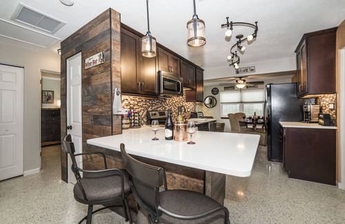 Gulfport House | Gulfport Beach Vacation Rental, 2 Bedroom WINE CELLAR THEMED, 5 Star Beach House