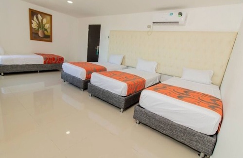 El Prado Hotel | Habitacion Delux Cuadruple Cerca Al Malecón Turístico Río Magdalena Barranquilla