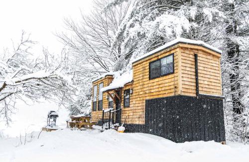 Johnson House | Haven Tiny House w hot tub on river near Stowe