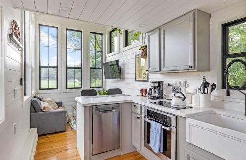 Johnson House | Haven Tiny House w hot tub on river near Stowe