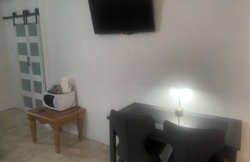 Crown Point Villa | HCeas guest bedroom- close to beaches