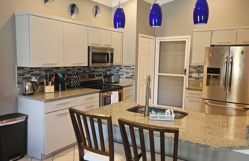 River Pointe House | HEATED Pool! Peaceful Waterfront Home Near Anna Maria!