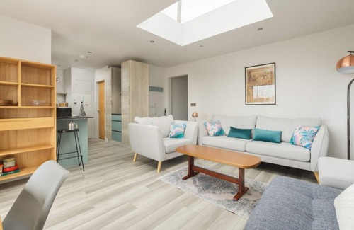 Port Saint Mary Cottage | Heather Cottage is a beautifully light and airy seaside cottage a stone's throw from the picture per