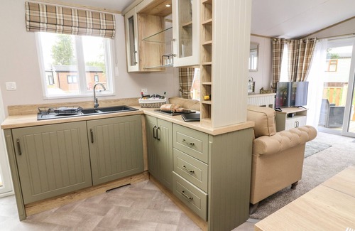 South Lakeland Leisure Village Cottage | HEDGEHOG LODGE, pet friendly in South Lakeland Leisure Village