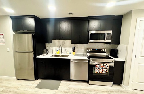 Southwest Calgary House | Hidden Gem: Modern 2BR | 2 Bathroom Suite with Private Entrance