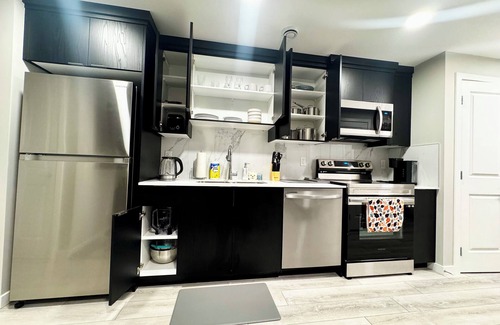 Southwest Calgary House | Hidden Gem: Modern 2BR | 2 Bathroom Suite with Private Entrance