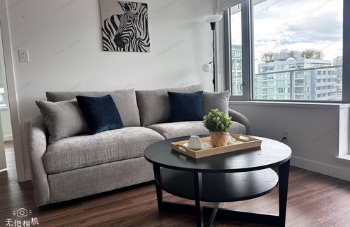 Southeast False Creek Condo | High end condo vacation home downtown Vancouver. Family friendly, new furniture