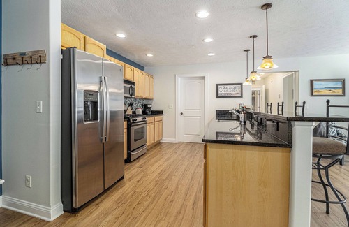 Traverse City Condo | High-End Downtown Traverse City Ground Floor Condo on Quiet Street