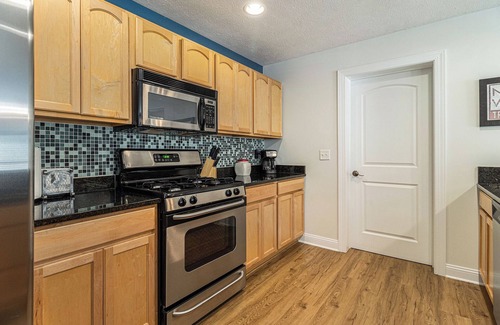Traverse City Condo | High-End Downtown Traverse City Ground Floor Condo on Quiet Street