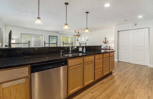 Traverse City Condo | High-End Downtown Traverse City Ground Floor Condo on Quiet Street