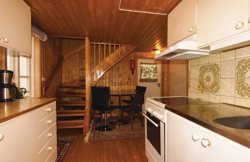 Dalstorp House | High situated cottage on a farm overlooking a pond with noble fish.