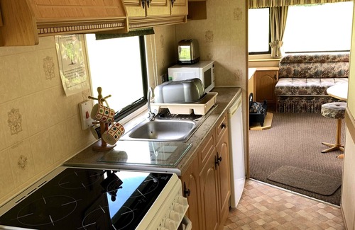 West Laroch House | Highland Haven: Your Caravan Retreat Near Glencoe