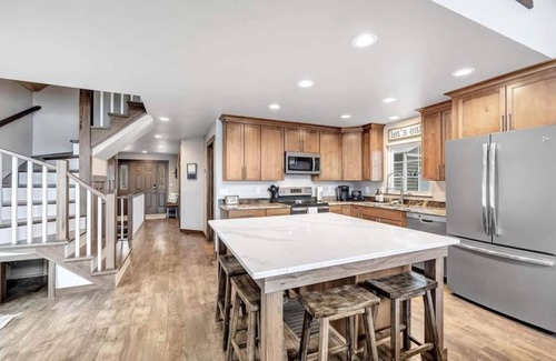 Krakow House | Highlights: Private beach just steps from your door Includes kayaks for exploring the lake Great fishing right off the shoreline or dock Bring your boat and enjoy full boating access Cozy indoor fireplace for cool evenings 4 spaciou