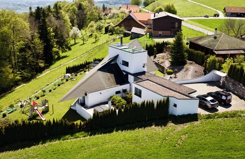Riggisberg Villa | Hilltop Luxury Villa with Minigolf, Indoor Pool, Wellness & Spa