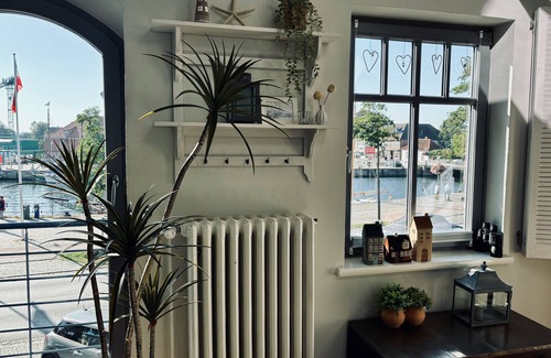 Neustadt in Holstein Apartment | Hilly vacation apartment in a small fisherman's house right on the harbor