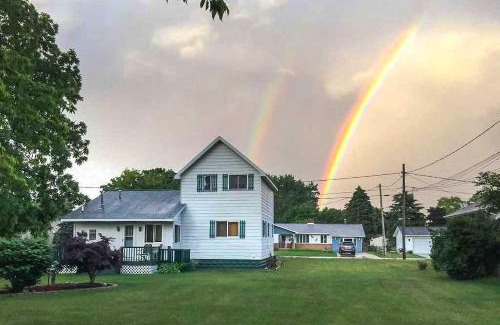 Tawas City House | Hip Downtown Cottage - Walk to Beach, Pier, Dining