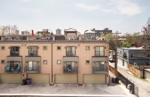 City Park West Apartment | Hip Uptown 1BR w/ W/D & Juliette balconies, near Zoo, by Blueground